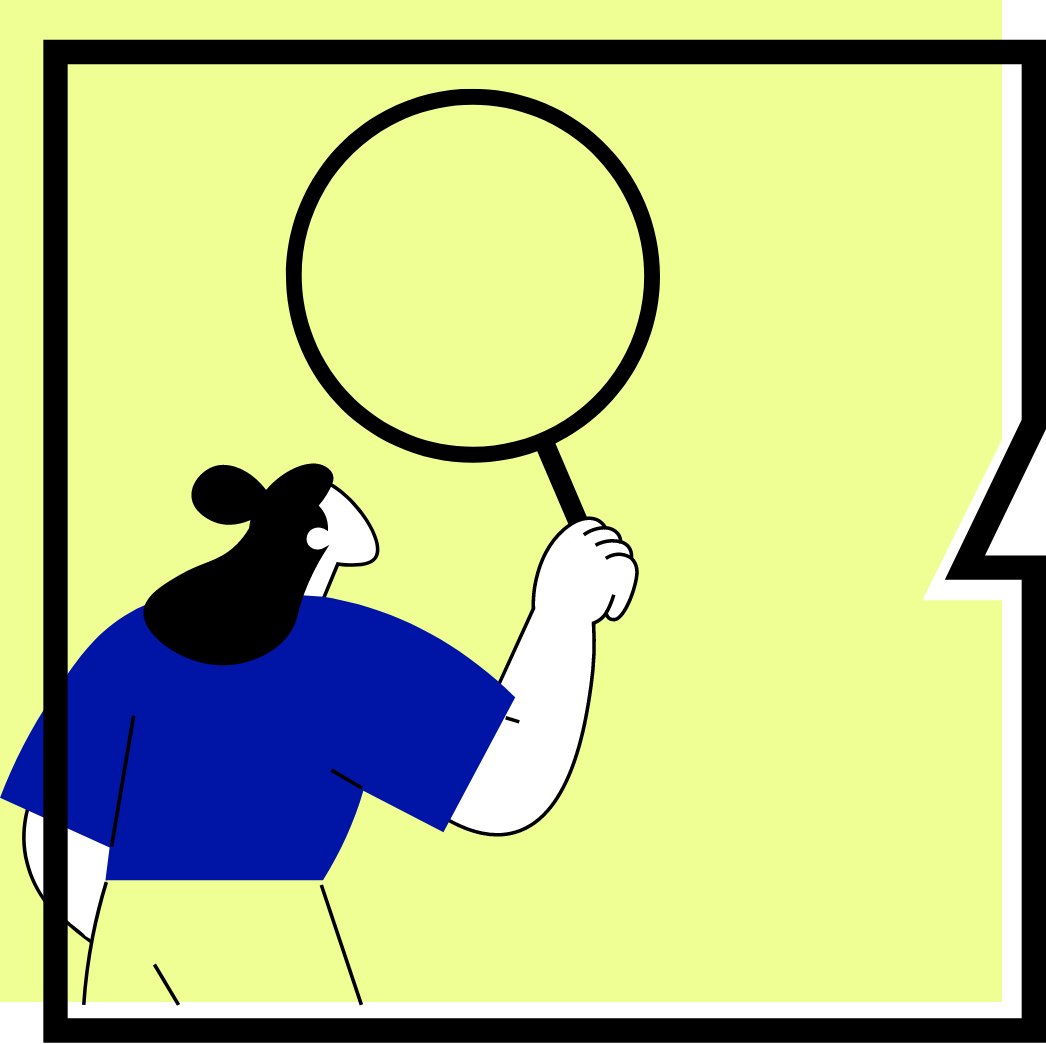 A person wearing a blue top is looking through a large magnifying glass.